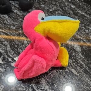 Vibrant Pink and Yellow Stuffed Bird Toy